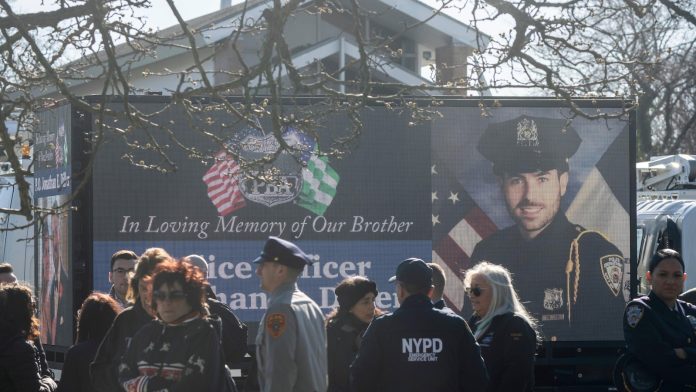 Man convicted in killing of NYPD officer sentenced to 115 years to life in prison