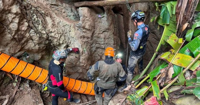 5 villagers stuck in a flooded cave for more than a week found alive in Laos, rescuers say