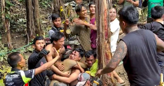 Four more men rescued after more than a week trapped in a flooded cave in Laos