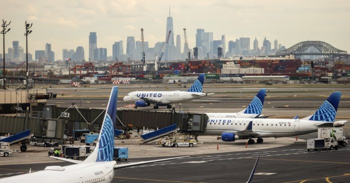 Driver on N.J. Turnpike hurt as United plane hits pole on approach to Newark airport