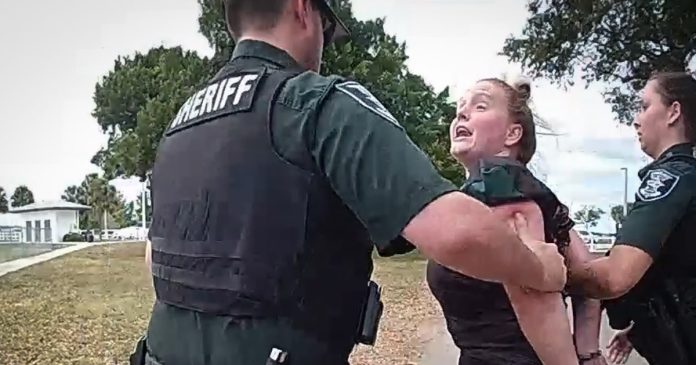 Florida woman arrested after allegedly kicking a kid at youth football game during on-field brawl