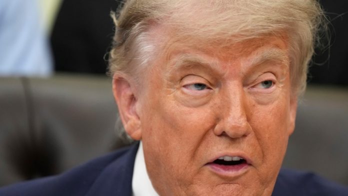Trump says he's postponing signing an executive order on AI out of concern it would hurt AI industry