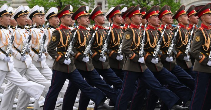 North Korean troops join Putin’s scaled-back military parade as Ukraine agrees temporary ceasefire