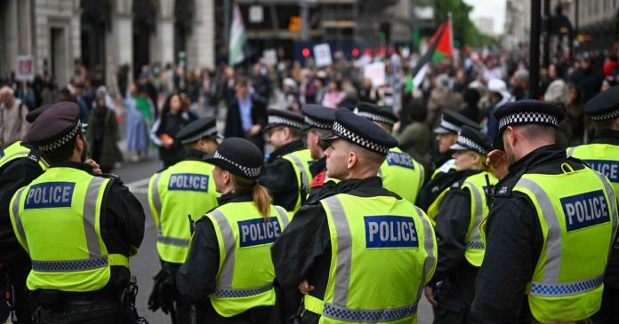 London police out in force to deal with rival rallies and a soccer final