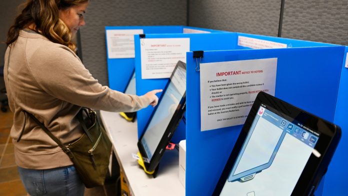 Georgia's vote-counting method will soon be banned. Lawmakers will try to find a fix this week