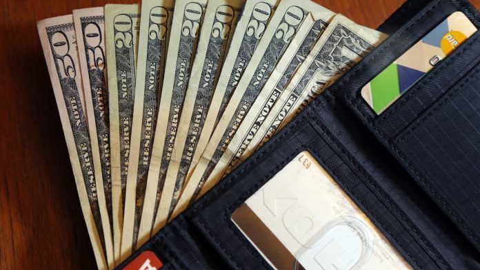 How can I illustrate our financial position to a spouse who shows little interest?