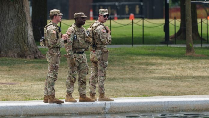 DC reaches settlement with man who protested troops' patrol with Darth Vader song
