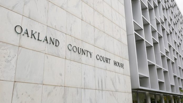 Woman pleads no contest to abuse after 3 kids are found living alone for years