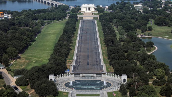 Drained Reflecting Pool reveals Trump's 'American flag blue' liner is now closer to gray