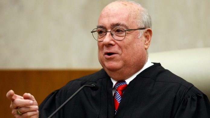 Judge weighs bid to block or reverse transfers of transgender inmates into a segregated prison unit