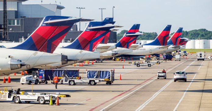 Delta passengers evacuated by slide after emergency landing in Atlanta