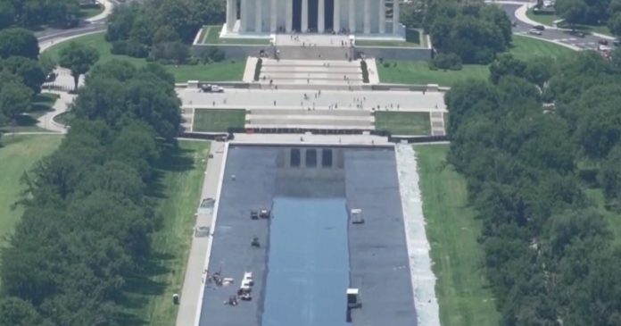 Charges dropped against former Olympian over reflecting pool damage