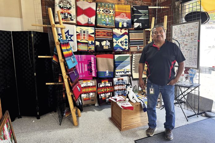 Native Americans, once caricatured, ponder: Reject Route 66, or use it to seed business?