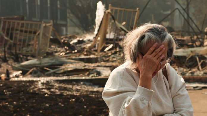 Washington state fires destroy hundreds of buildings and force Spokane-area residents to evacuate