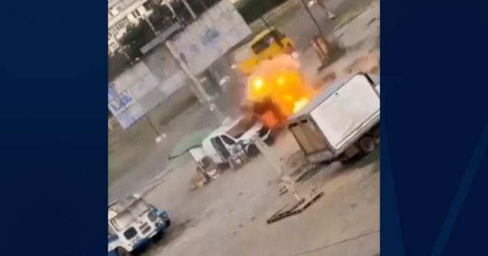 Drone chases Ukrainian man around van before exploding