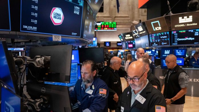 US futures climb ahead of more inflation data, though major indexes are down for the week