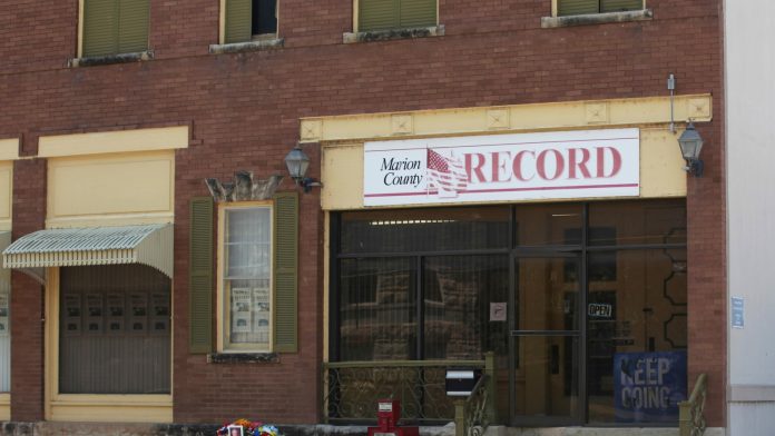 Kansas town will pay $850K to end reporter's lawsuit over 2023