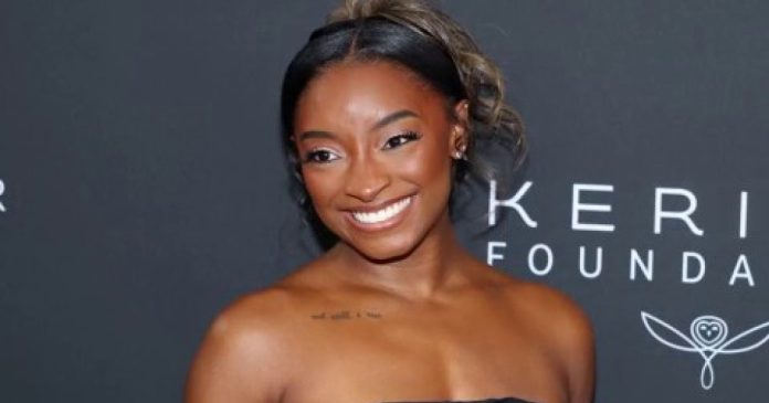 Simone Biles says three masked men stole luxury car from her Chicago-area home
