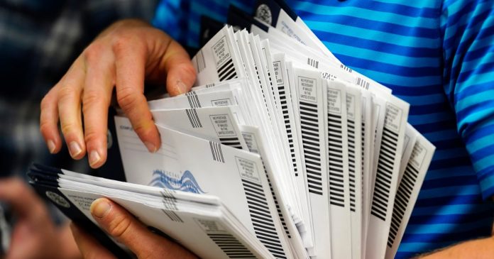 Judge again blocks Trump’s effort to restrict mail voting as ballots start going out